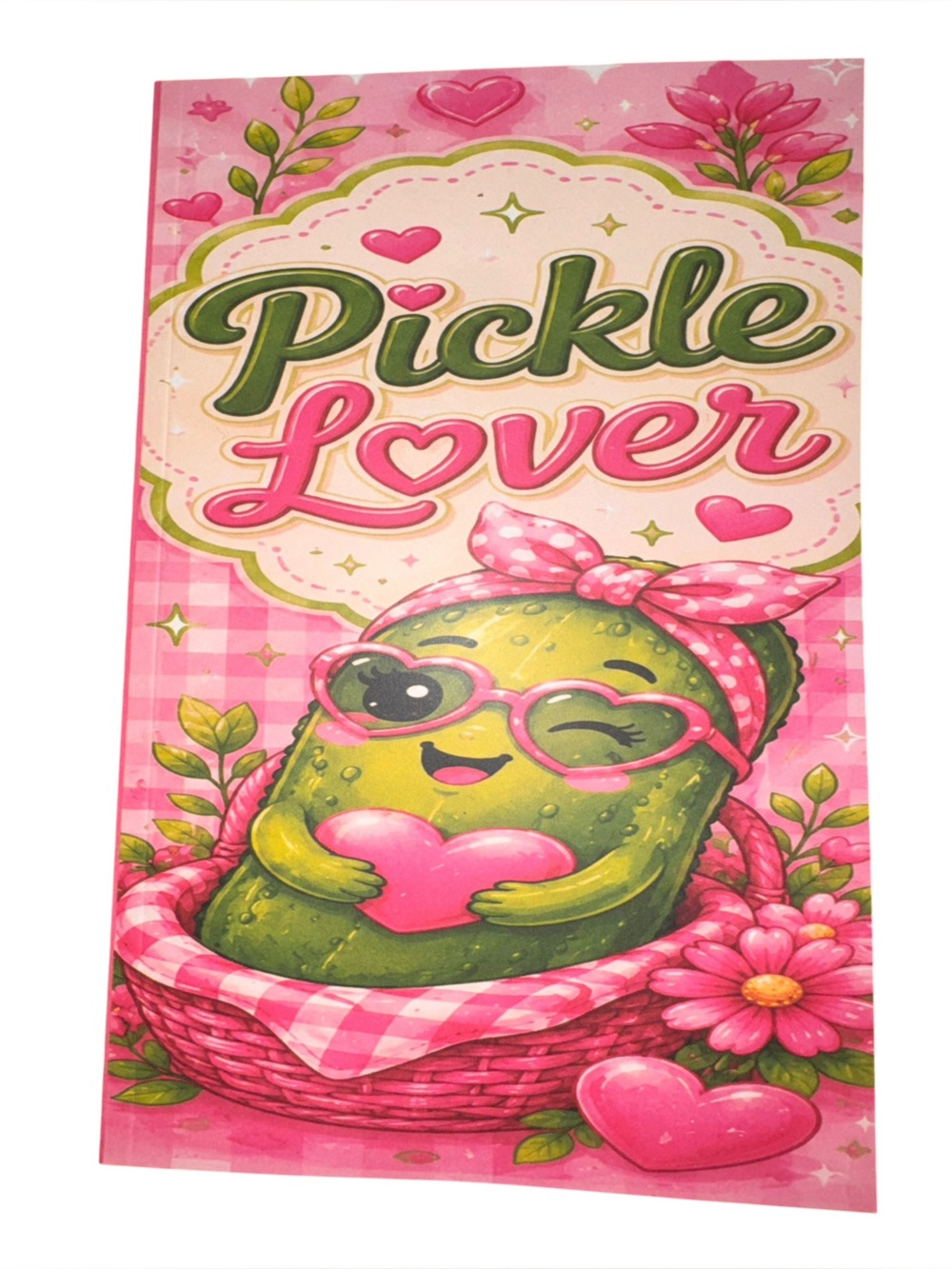 Cute Pink Pickle Art Print on a notebook